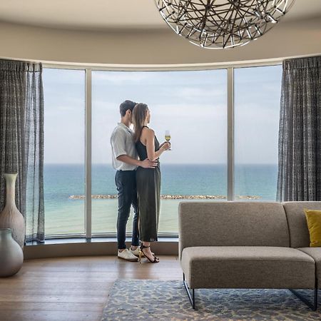 Royal Beach Hotel Tel Aviv By Isrotel Exclusive Exterior photo The view from the living room of a suite at the Hilton Tel Aviv