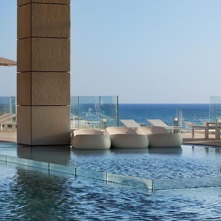 Royal Beach Hotel Tel Aviv By Isrotel Exclusive Exterior photo The pool at the hotel
