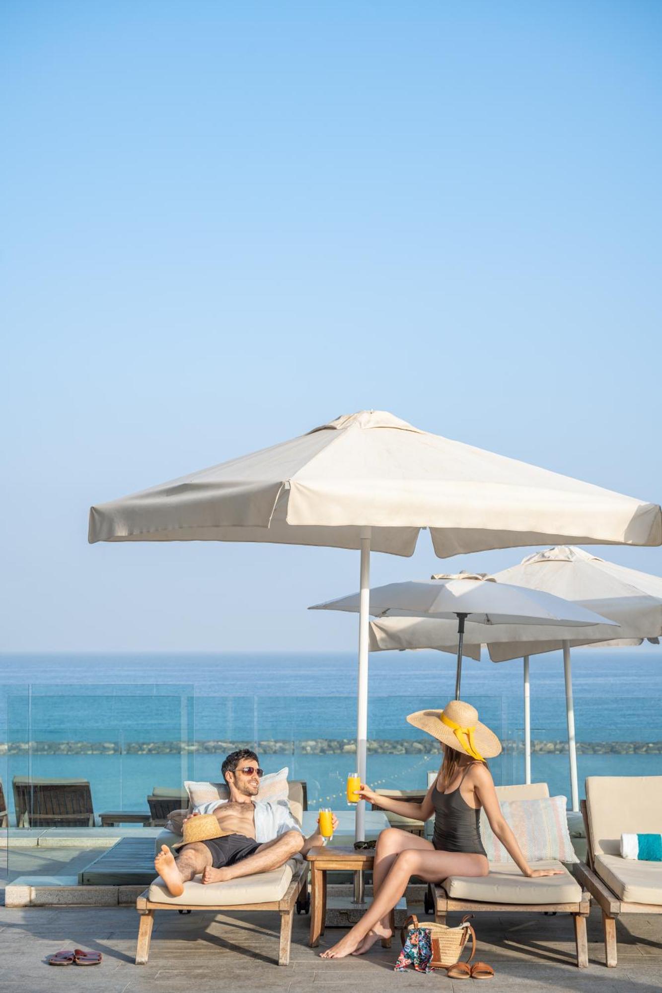 Royal Beach Hotel Tel Aviv By Isrotel Exclusive Exterior photo Beach umbrella