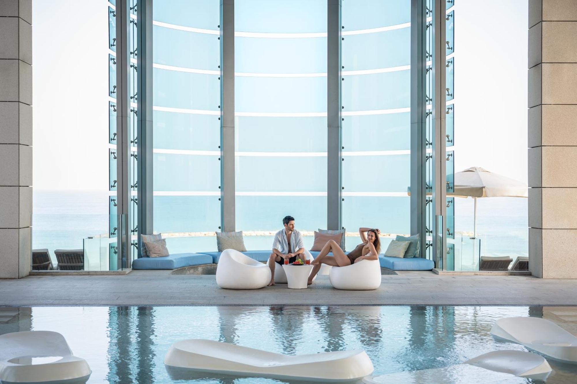 Royal Beach Hotel Tel Aviv By Isrotel Exclusive Exterior photo The Cove Lounge at Dubai International Airport