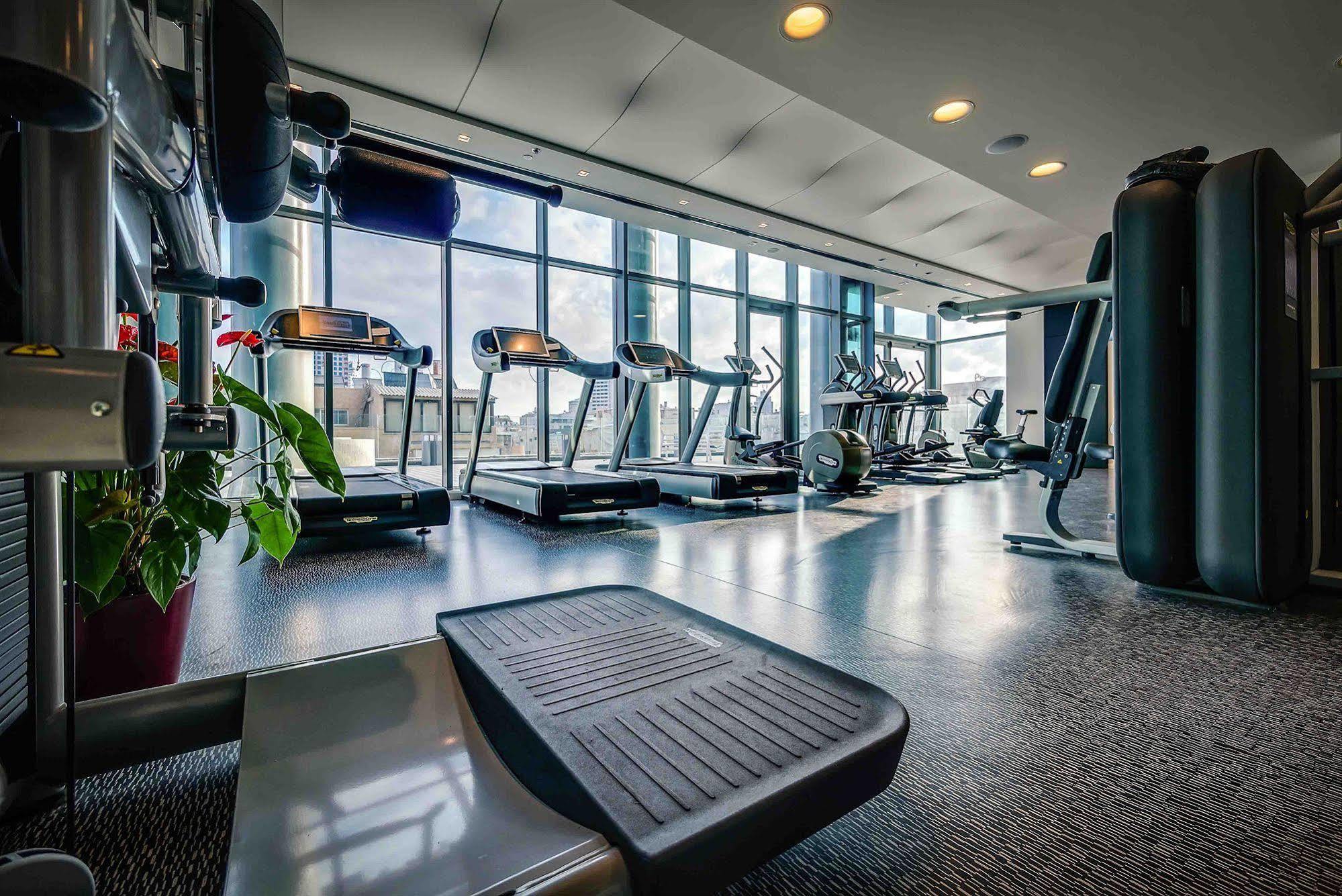 Royal Beach Hotel Tel Aviv By Isrotel Exclusive Exterior photo The gym at the 100th floor of the tower