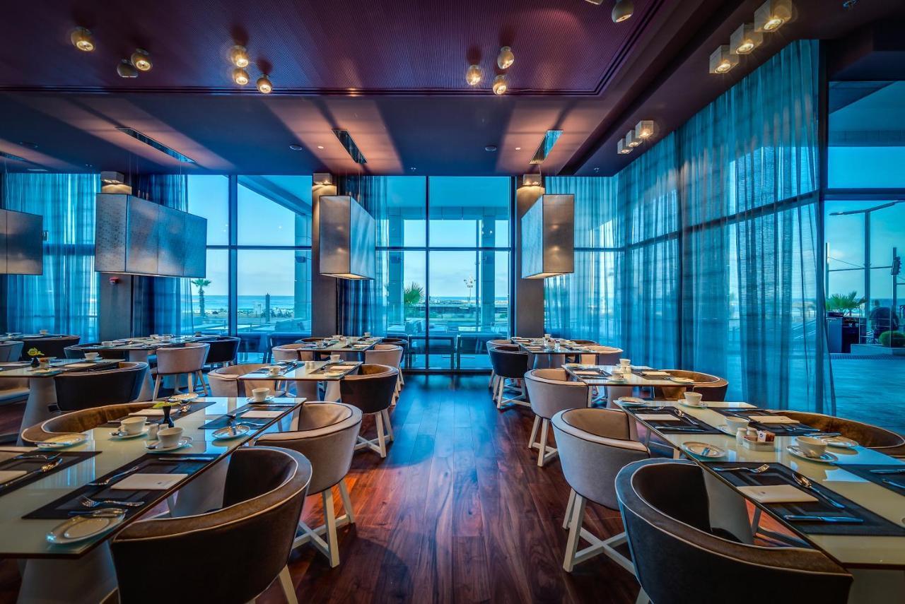 Royal Beach Hotel Tel Aviv By Isrotel Exclusive Exterior photo The restaurant