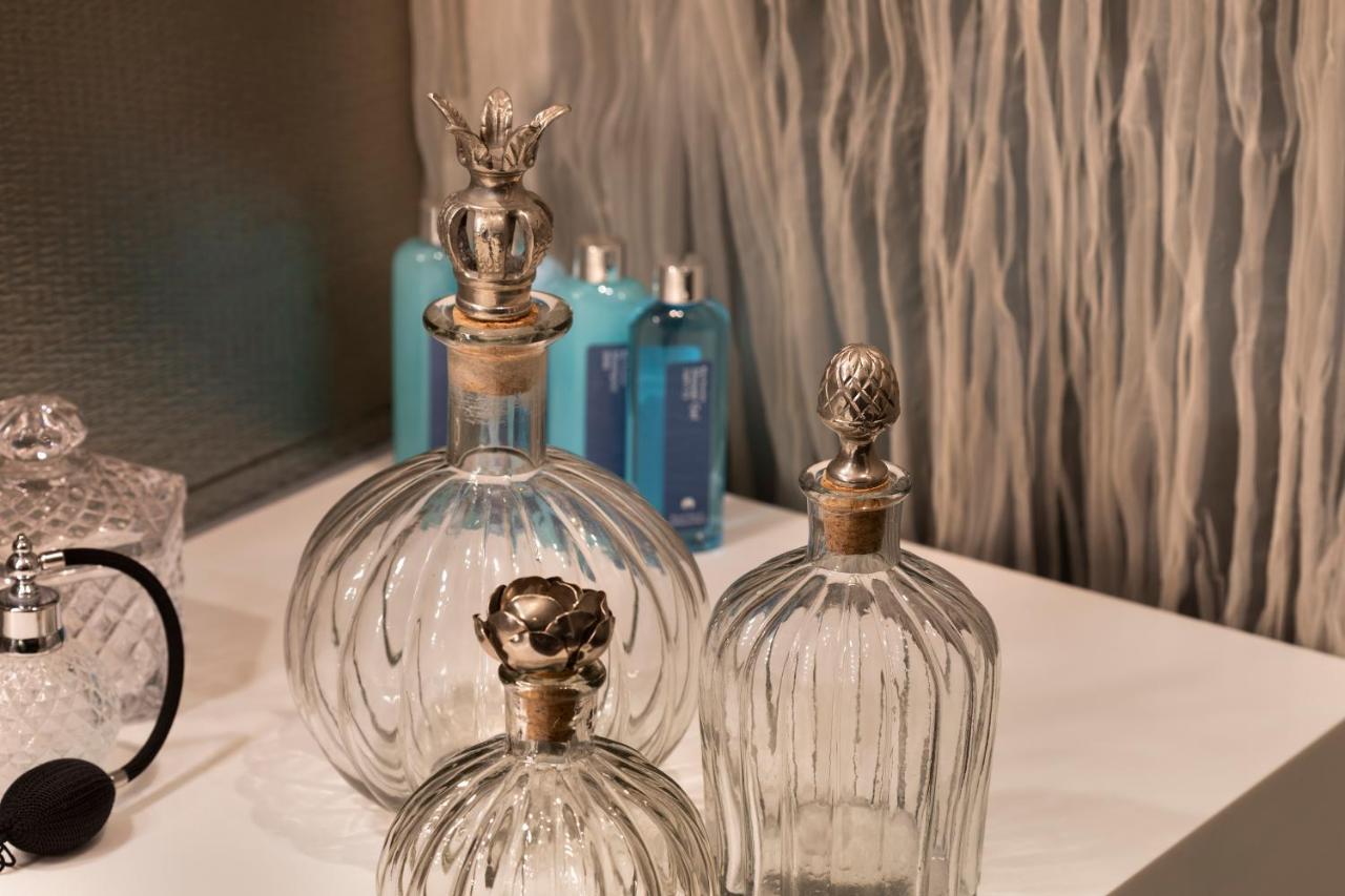 Royal Beach Hotel Tel Aviv By Isrotel Exclusive Exterior photo Perfume bottles